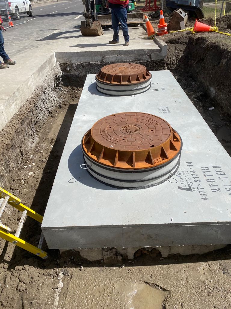 Completed ASI Tech precast manhole structure on a city project